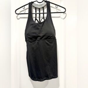 Women’s strappy back workout top. 🏋️ Like new. Built in bra removable padding 💪